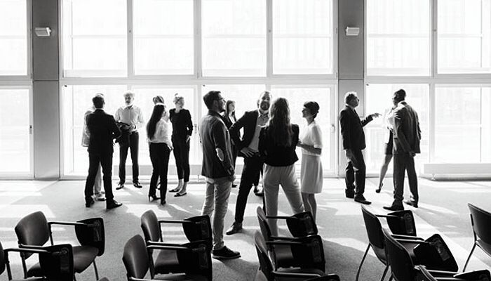 UK industries events People standing in event meeting